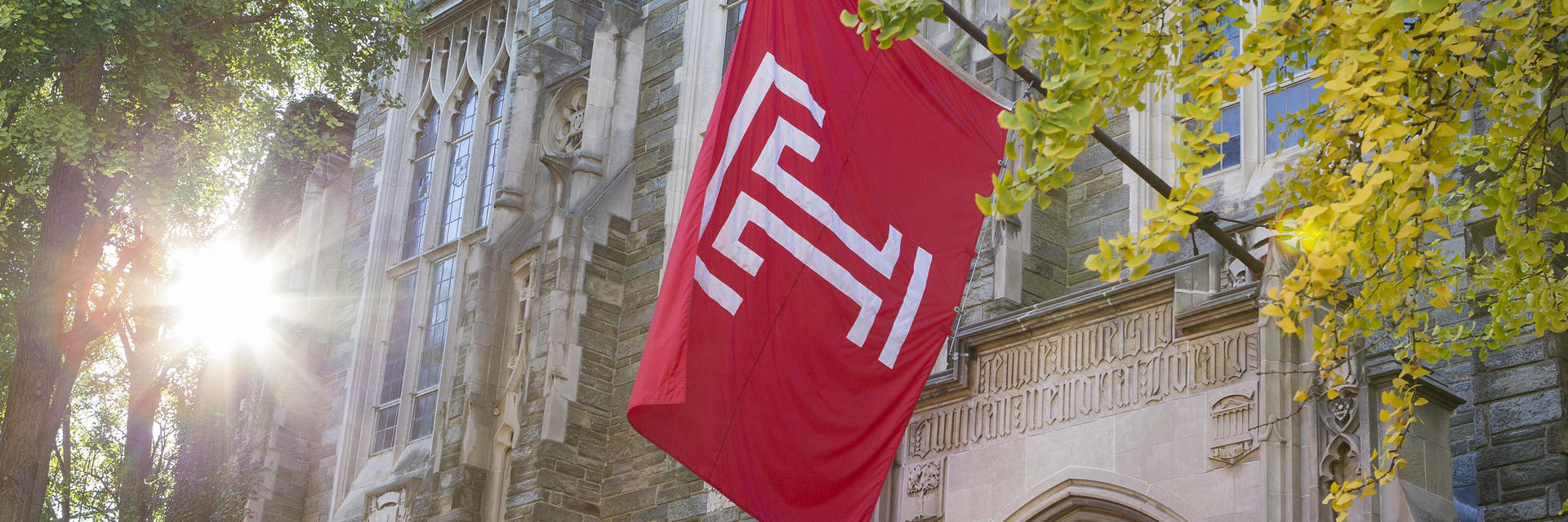 Temple's banner hangs outside of Sullivan Hall.